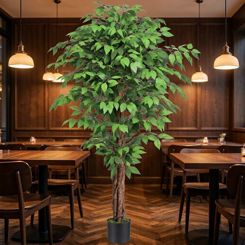 Potted artificial weeping fig in a restaurant interior