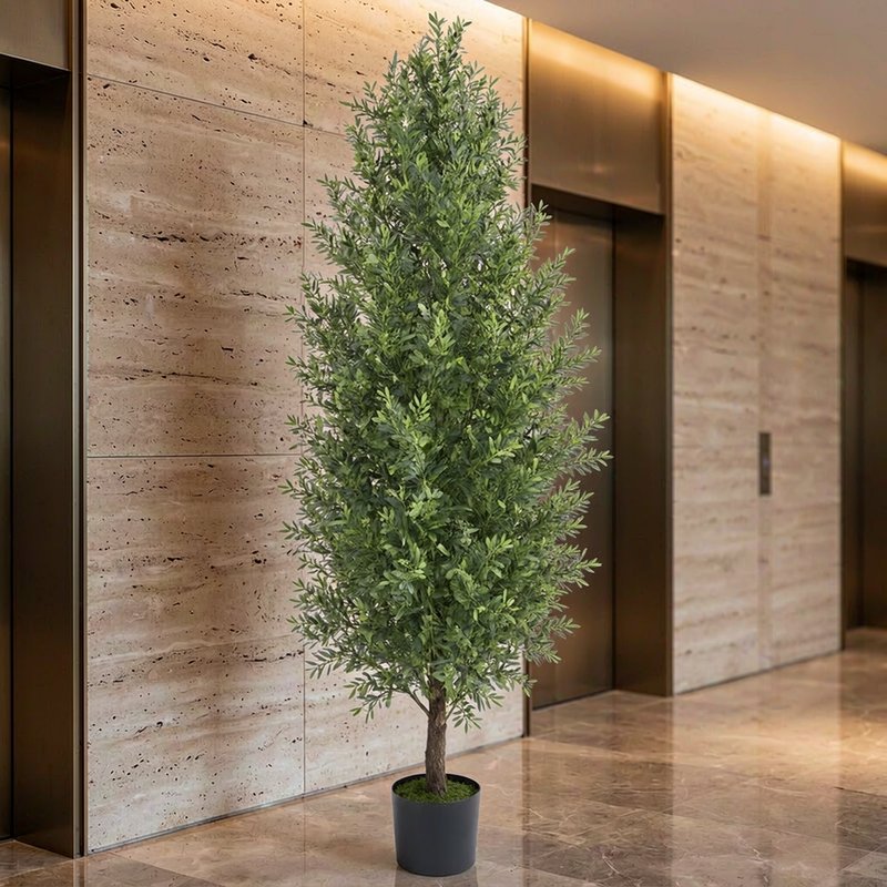 Potted artificial conifer in a hotel elevator lobby